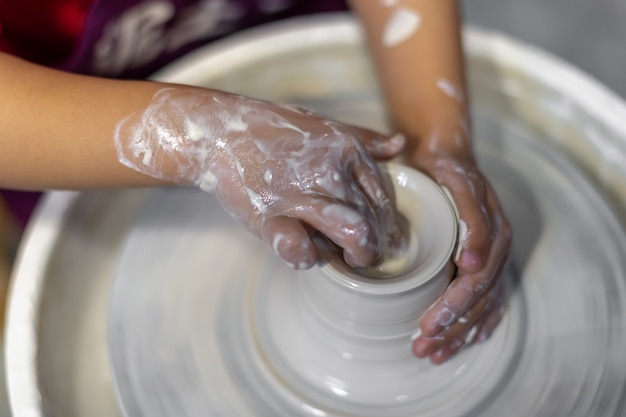 The process of making pottery in a Pottery Workshop