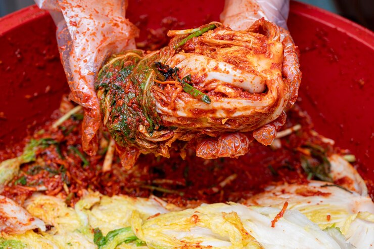 Photo the process of making a traditional korean dish kimchi