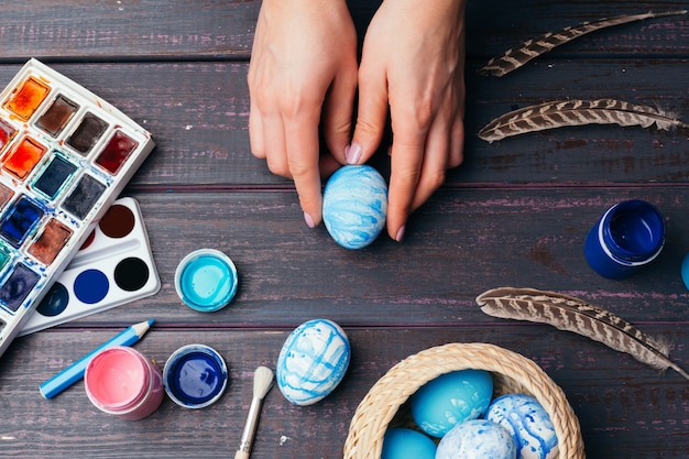 Process of painting Easter eggs