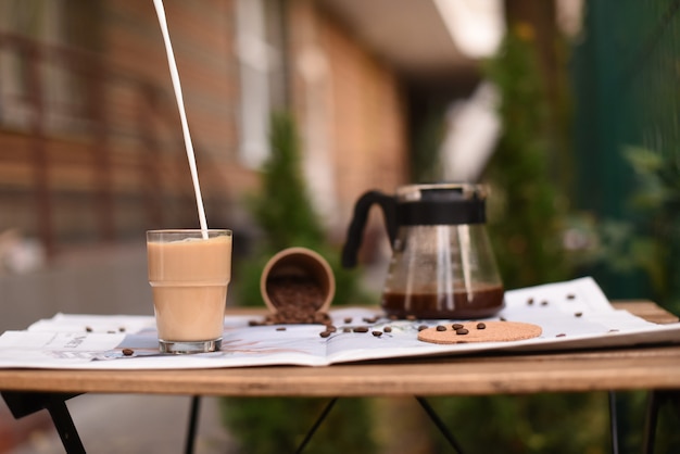 The process of pouring milk in coffee