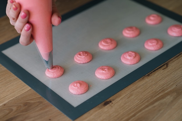 The process of preparing delicious and beautiful macaroons.