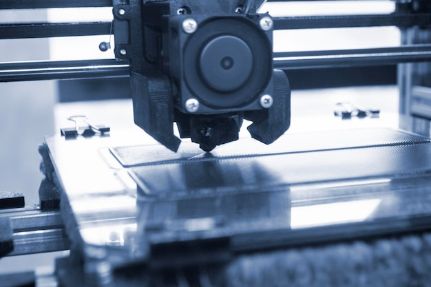 the process of printing on 3d printer 3d printer creating model from molten plastic closeup molten