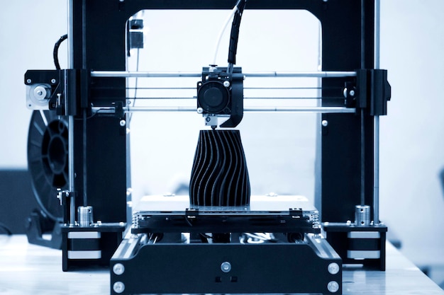 The process of working d printer and creating a threedimensional object