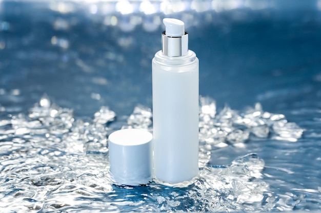 Product mockup A bottle of white liquid sits in a bathtub with a small container in the water