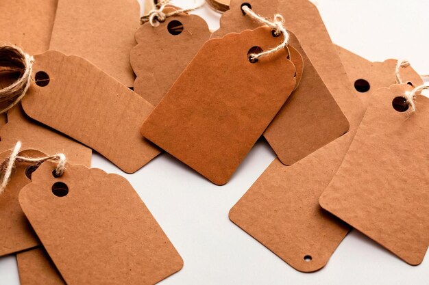 Product packaging mockup photo of kraft clothing or gift tags studio advertising photoshoot