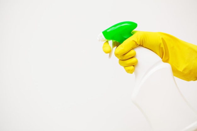 Product for professional cleaning on white wall background.