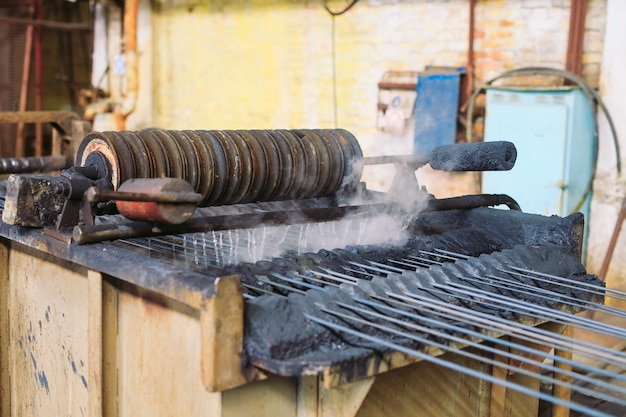 Productie van walsdraad in de metallurgische fabriek