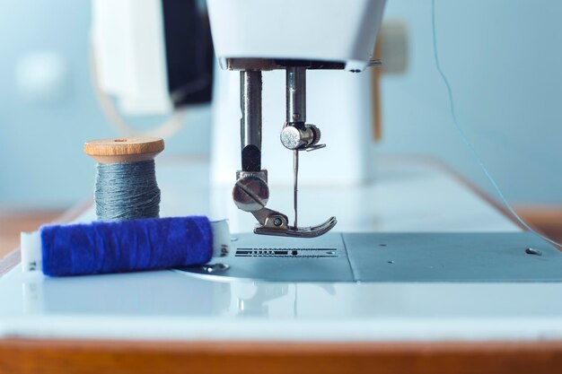 Photo production line sewing machine needle and footstep detail