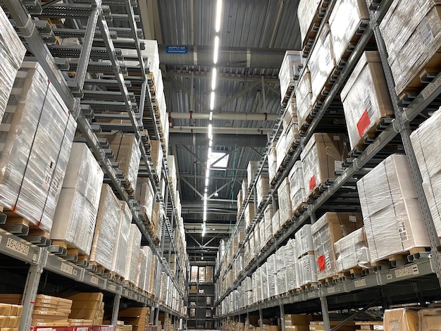 A production warehouse storage with huge boxes packages on the shelves