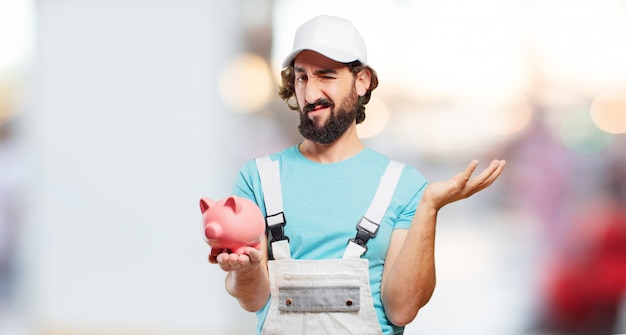 Profesional painter  with a piggy bank