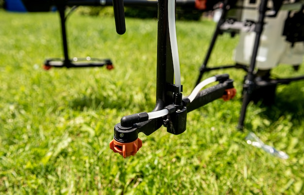 Professional agriculture drone on the green field