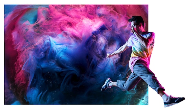 Professional break dancer posing in motion practicing modern hiphop dance against the background of abstract colorful smoke