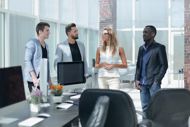 Photo professional business team standing in the officebusiness concept