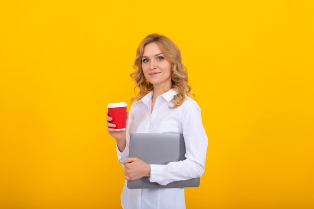 Professional business woman with laptop hold takeaway coffee or tea paper cup break