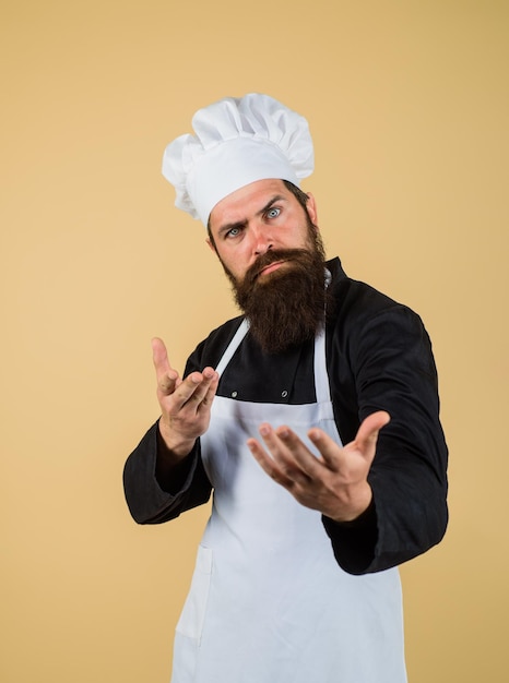 Professional chef man cooking food profession and inspiration concept man cook in chef hat and