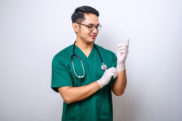 Professional and confident smiling asian physician nurse wear rubber gloves and stethoscope for patient examination