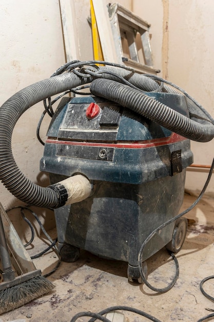 Professional construction vacuum cleaner used during the renovation