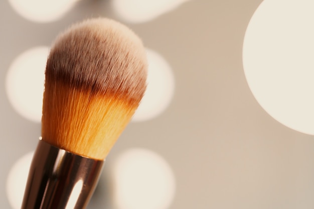 Professional dark make up brush, close up.