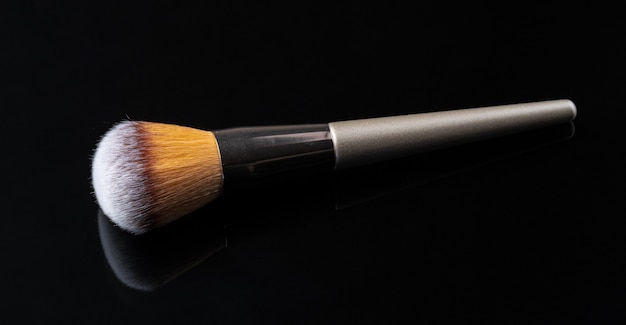 Professional dark make up brush, close up.