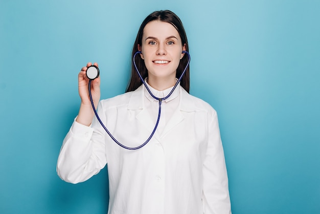 Professional doctor with stethoscope in ear listen you carefully attentively