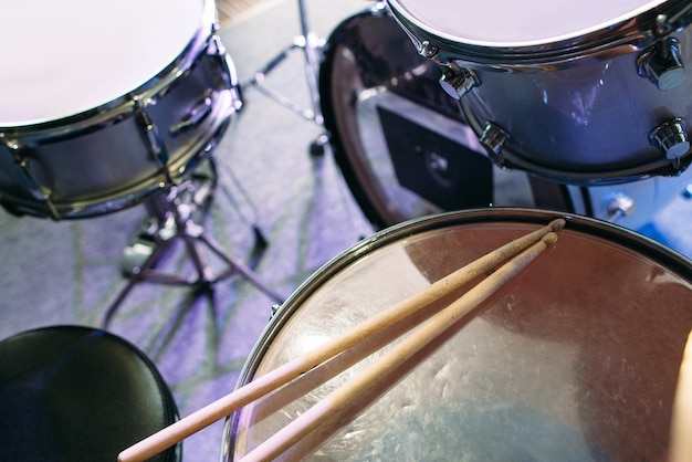 Photo professional drum set drumsticks