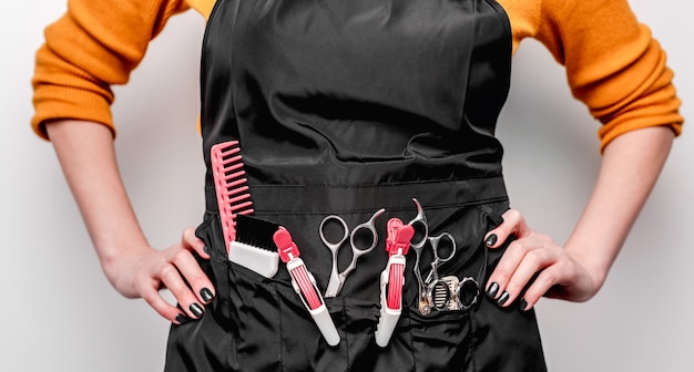 Professional equipment of hairdresser in work apron