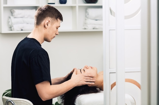 Professional face and head massage.