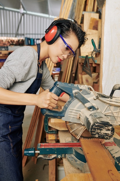 Professional female carpenter