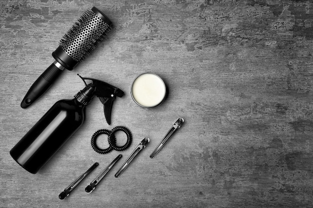 Professional hairdresser set on gray table