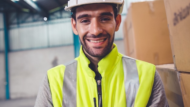 Professional industry worker close up portrait in the factory or warehouse