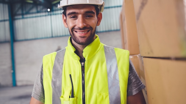 Professional industry worker close up portrait in the factory or warehouse