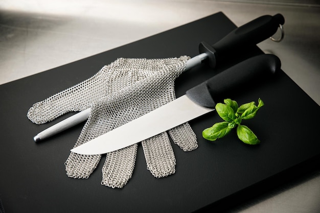 Professional kitchen. Knives, a board on the kitchen table