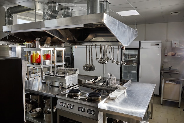 Photo professional kitchen in restaurant modern equipment and devices empty kitchen