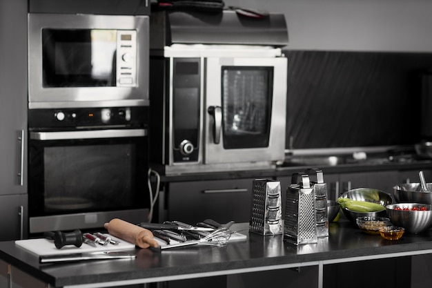 Photo professional kitchen with utensils