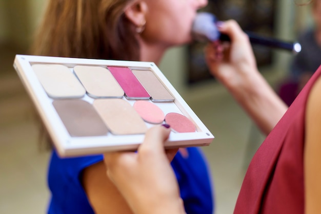 Professional make-up in a beauty studio.