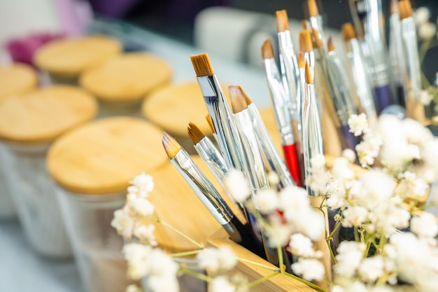 Professional makeup brushes in tube Master work place