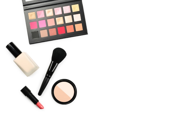 professional makeup products with cosmetic beauty products, foundation, lipstick,  eye shadows, eye lashes, brushes and tools.
