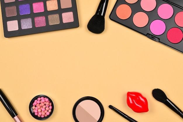 Professional makeup products with cosmetic beauty products foundation lipstick  eye shadows eye lashes brushes and tools