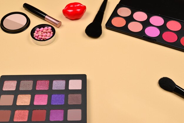 Professional makeup products with cosmetic beauty products foundation lipstick eye shadows eye lashes brushes and tools