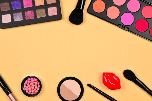 Professional makeup products with cosmetic beauty products foundation lipstick eye shadows eye lashes brushes and tools
