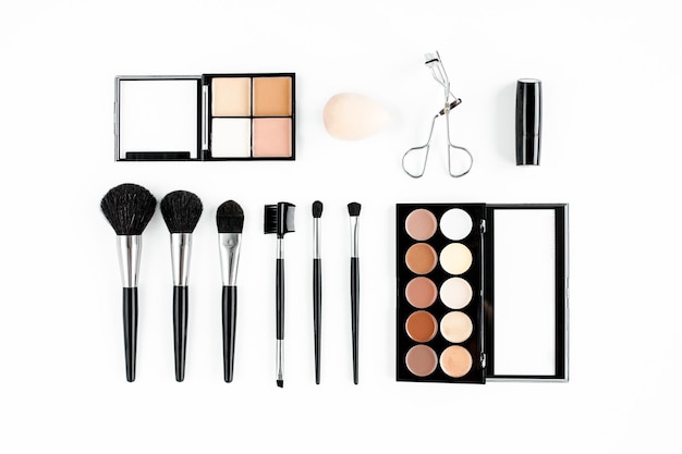 Professional makeup tools makeup tools brushes flat composition magazines social media top view flat