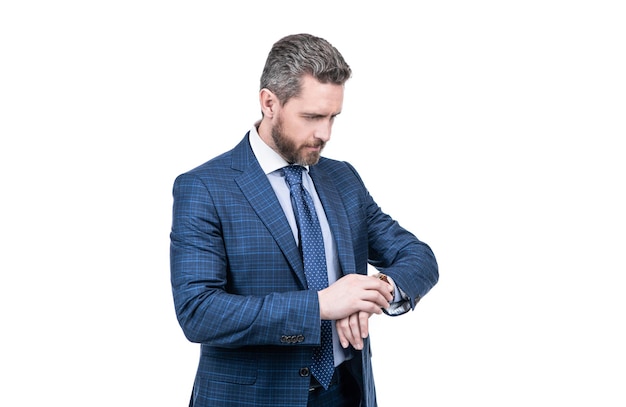 Professional man in formal suit check time by wrist watch isolated on white, punctuality.