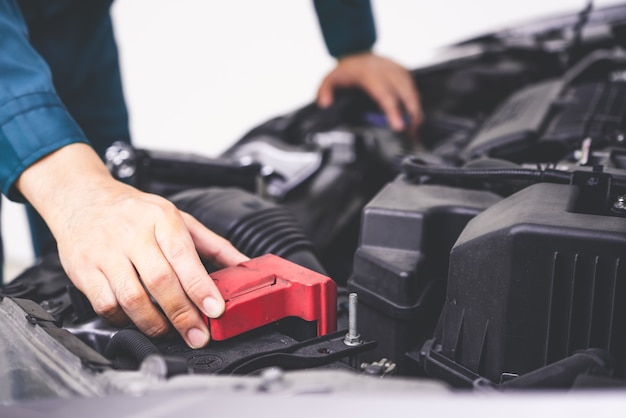 Professional mechanic hand providing car repair and maintenance service