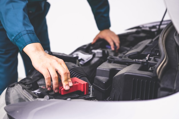 Professional mechanic hand providing car repair and maintenance service