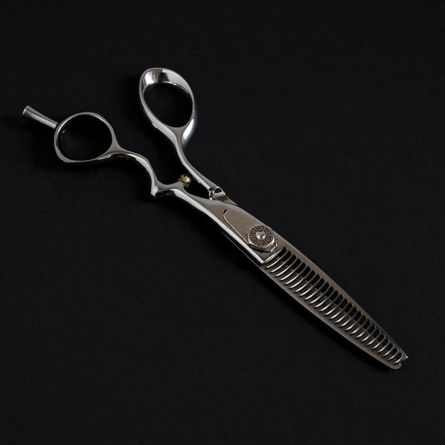 Photo professional metal scissors for men's haircuts