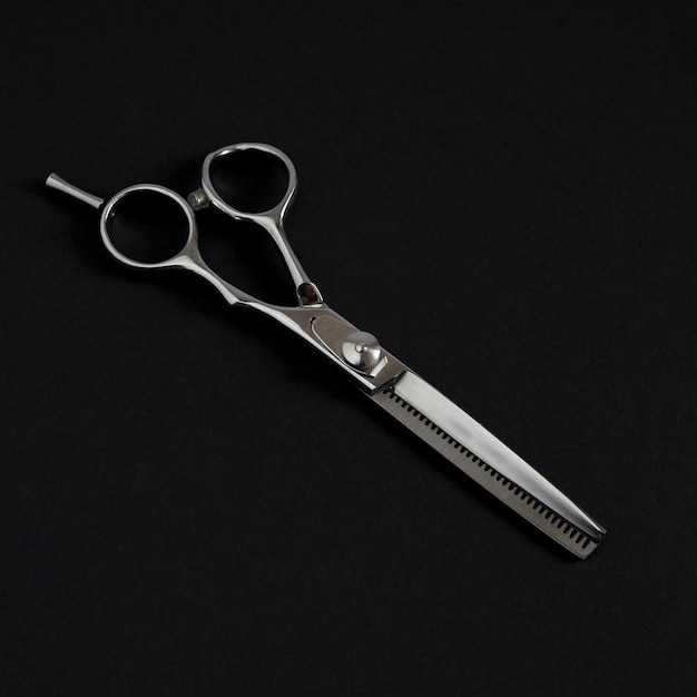 Photo professional metal scissors for men's haircuts