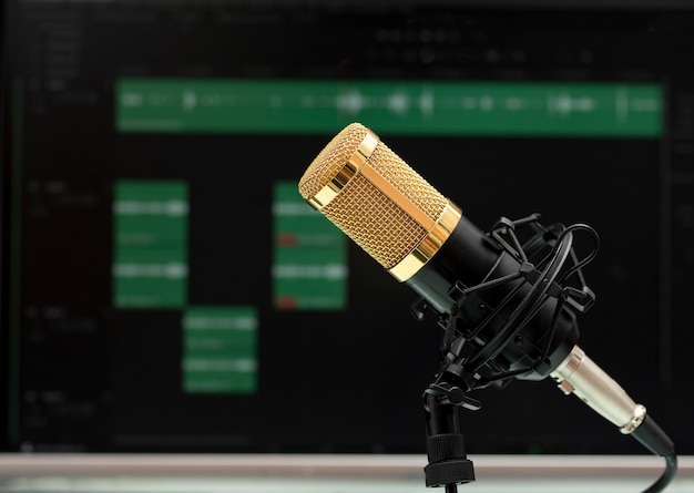 Professional microphone on work table for podcast broadcasting\
or radio speech