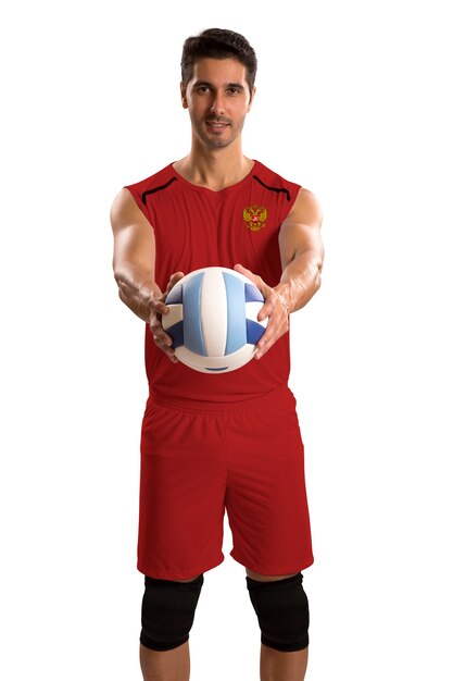 Профессиональный российский волейболист с мячом. Изолированные на белом пространстве.