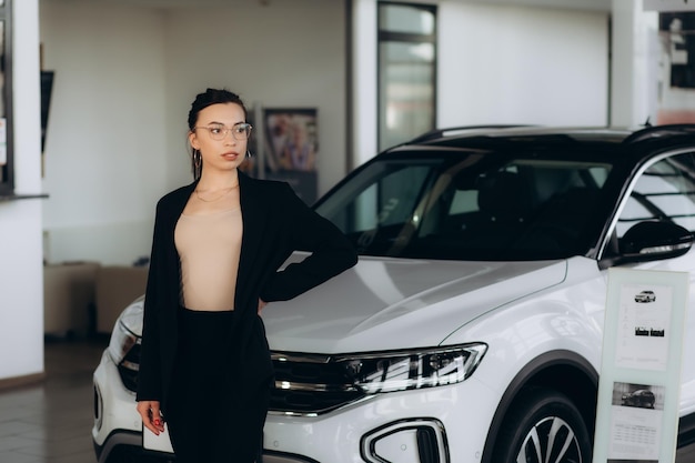 Professional salesperson working in car dealership