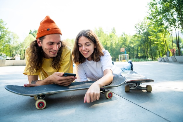 Professional skateboarders having fun at the skate park